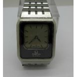 An Omega Equinoxe Reverso quartz wristwatch, Omega stainless steel strap, 32mm diameter,