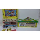 A Corgi Royal Mail CP10502 Circus Trailer set and a Corgi Fairground Attractions 2002 set,