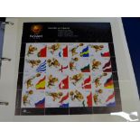 A Euro 2004 participating teams stamp collection and one volume The World Cup,