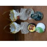 Three glass paperweights including M'dina, two glass scent bottles,