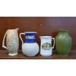 Three jugs and a Royal Lancastrian vase, height of vase 20.