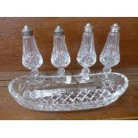 Four Waterford crystal shakers and dish,