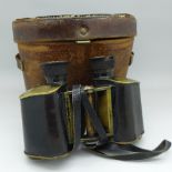 A pair of early 20th Century Carl Zeiss Jena binoculars, with brass mounts, one eyepiece a/f,