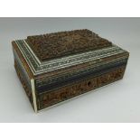 A 19th Century carved Indian vizagapatam box,
