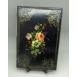 A black lacquer and mother of pearl decorative blotter cover