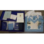 A Masonic case containing regalia, Year Books, etc.