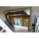 An oak octagonal framed mirror, an Art Nouveau mirror, another mirror,