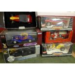 Six large die-cast model vehicles, boxed,