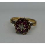 A 9ct gold, diamond and red stone ring, 2.