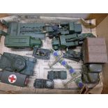 A collection of die-cast military vehicles including a Britain tracked lorry with driver and