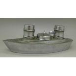 A chrome plated cruet in the form of an ocean liner,