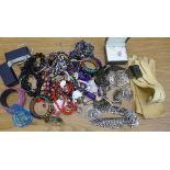 A plated belt, two pairs of lady's gloves, costume jewellery, bangles, etc.