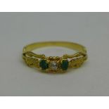 An early Victorian emerald and diamond ring, set in yellow metal, 1.