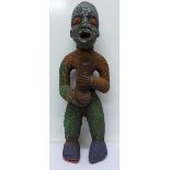 An African beaded Bamileke fertility statue,