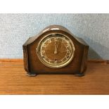 An George V oak mantel clock with chiming movement