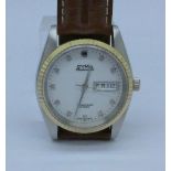 A Cyma Cymaflex day date, new, old stock wristwatch with Swiss Eta 2834 25 jewel automatic movement,