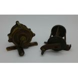 Two small fishing reels,