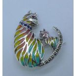 A modern silver cat brooch,