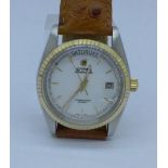 A Cyma Cymaflex day date, new, old stock wristwatch with Swiss Eta 2836 25 jewel automatic movement,