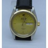 A Cyma Cymaflex day date, new, old stock wristwatch with Swiss Eta 2834 25 jewel automatic movement,