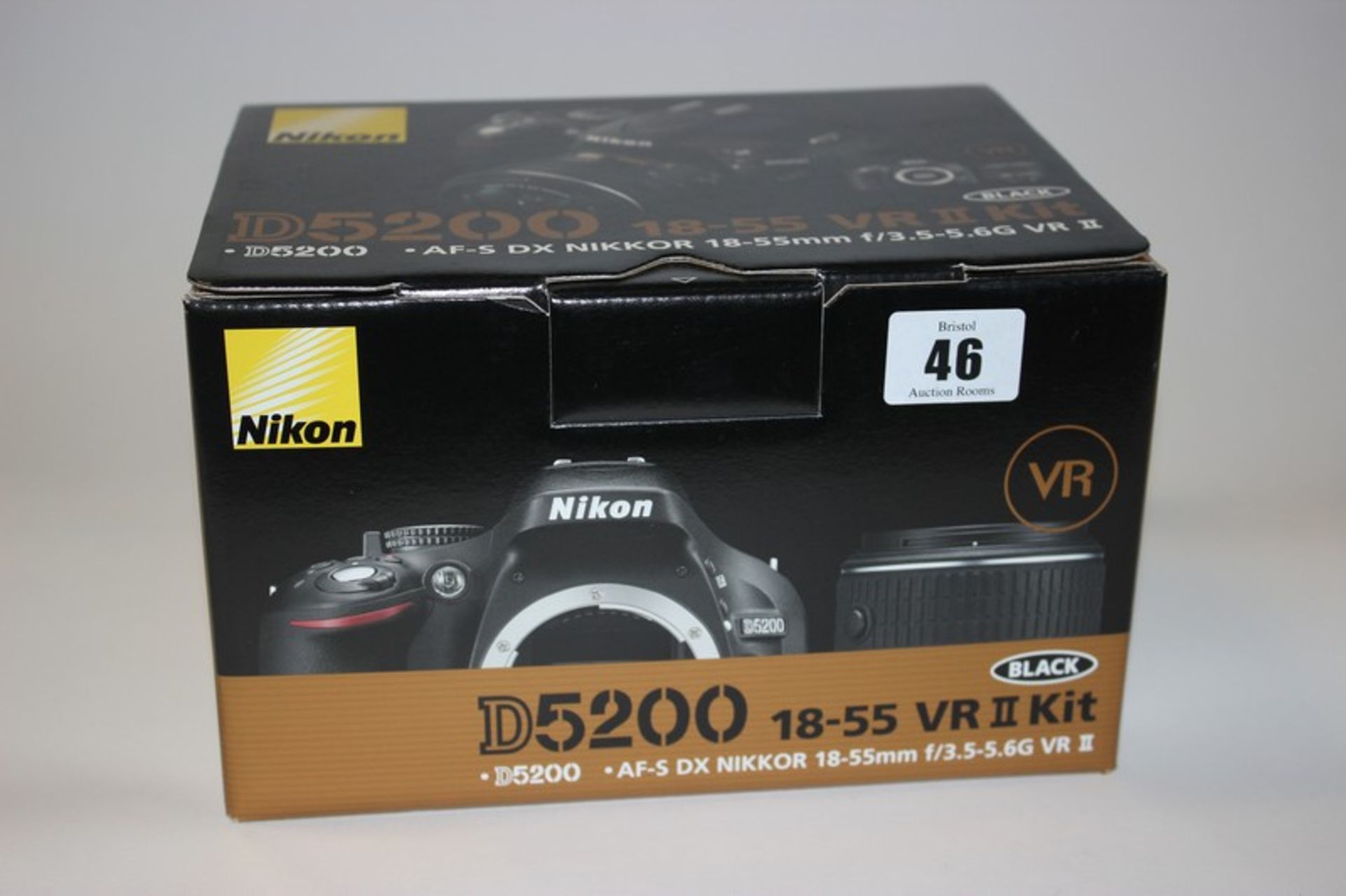 A Nikon D5200 18-55mm VR II Kit (Boxed as new).