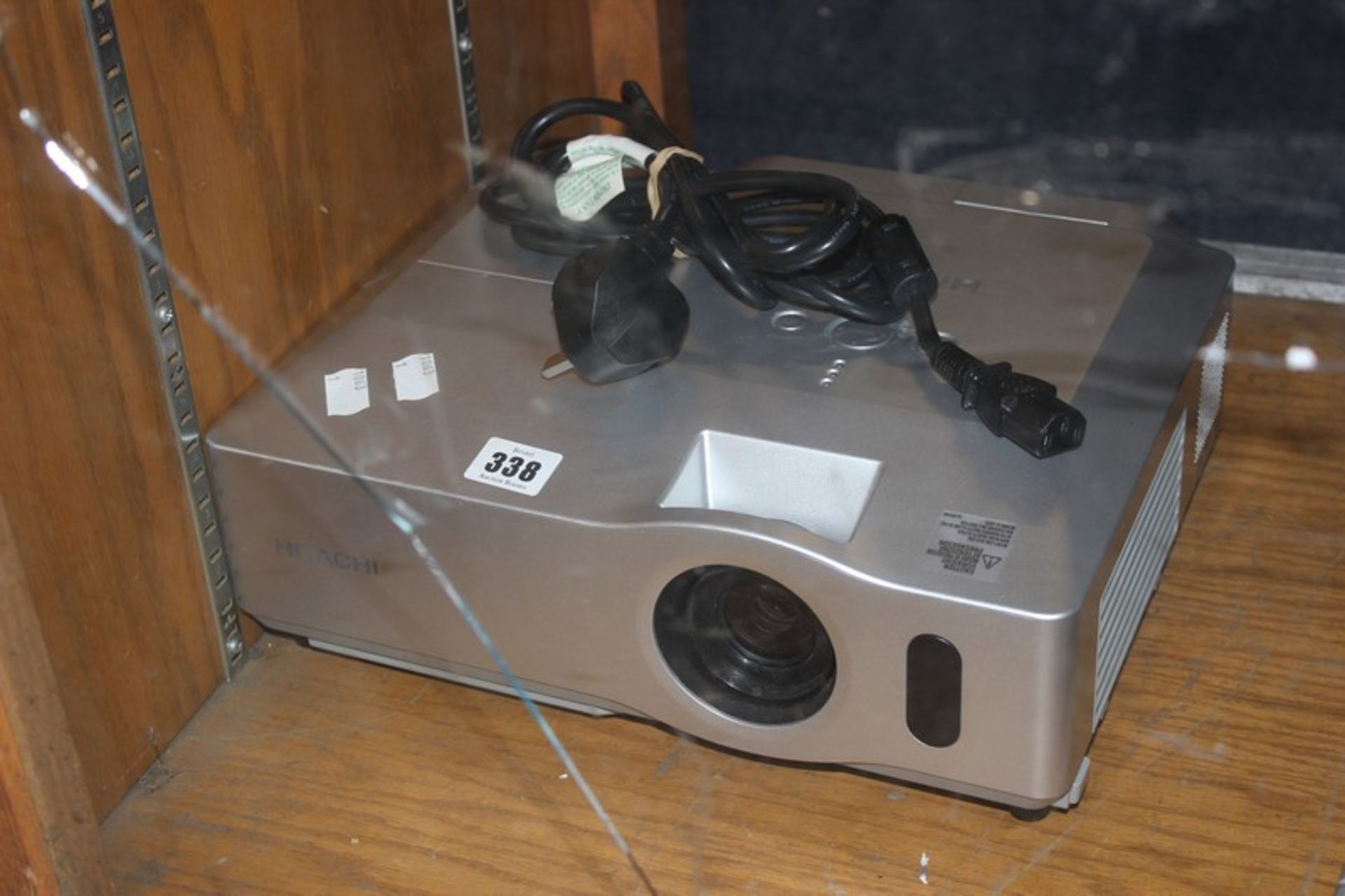 A Hitachi CP-X305 projector.