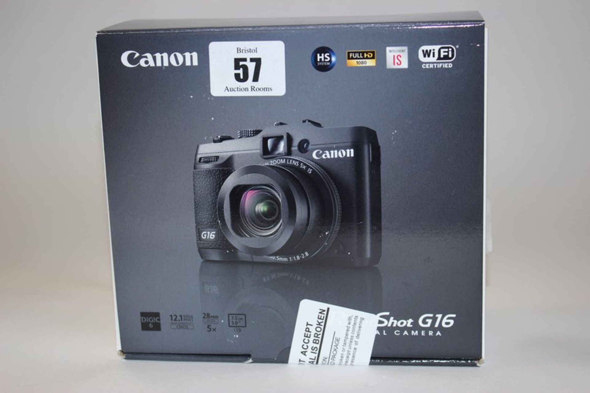 A black Canon PowerShot G16 digital camera (Boxed as new).