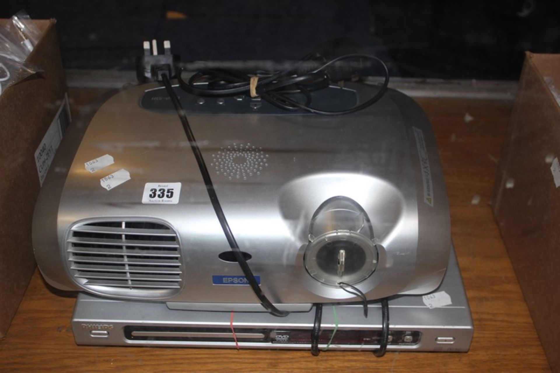 An Epson EMP-S1H projector and Philips DVD player.