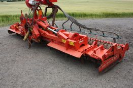 2005 Kuhn HR6003DR folding power harrow with packer roller. (Seeder in photos NOT included in sale)