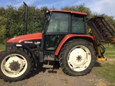 Fiat New Holland L95 4wd tractor with Bomford B457 flail mower. Reg No: P23 XVL. Hours: 6,600