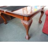 A Georgian style mahogany extending dining table,