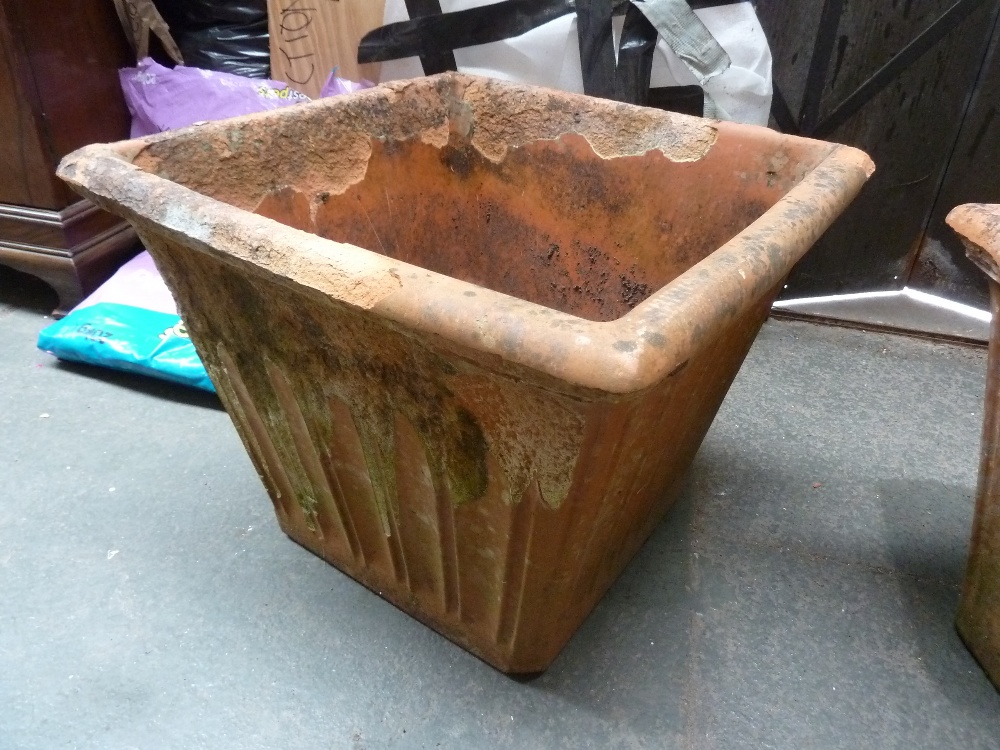 A square terracotta planter made in Italy 53cm square,