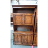 A 20th century mahogany cupboard unit,