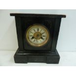 A 19th century mantle clock, enamel dial with Roman numerals,