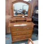 An early 20th century mahogany dressing table,