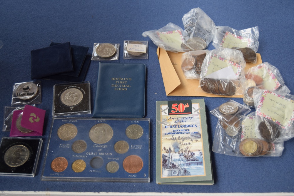 A mixed lot of British modern coins, including crowns, pennies, a First Decimal set,