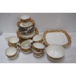 A Paragon china part tea service including cups, saucers, a jug, and side plates,