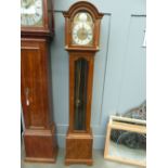 A modern grandmother clock, signed Canham, London, metal dial with Roman numerals,