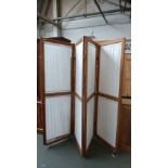 A pine four section screen with linen panels