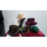 Mixed box of seven various styles of Autumn/Winter hats labelled 'Mad Hatters' and 'Whiteley' also