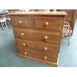 A pine chest of drawers,