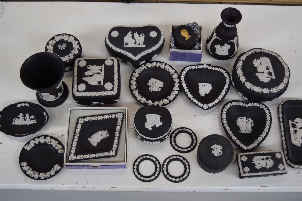 A quantity of Wedgwood black basalt jasperware including various trinket dishes and boxes,