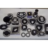 A quantity of Wedgwood black basalt jasperware including various trinket dishes and boxes,