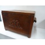 Two small wooden chests with hinged lids one with a carved ship motif