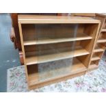 A 20th century light oak bookcase,