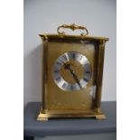 An Avia Quartz brass mantel clock,