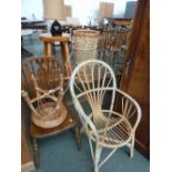 A mixed lot of furniture including a wicker armchair, oak kitchen chair, wicker stool, pine stool,