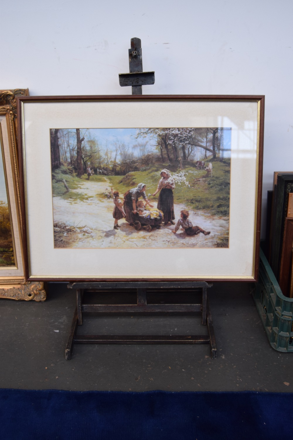 A vintage adjustable artists table top metal easel together with a framed Fred Morgan print (2)