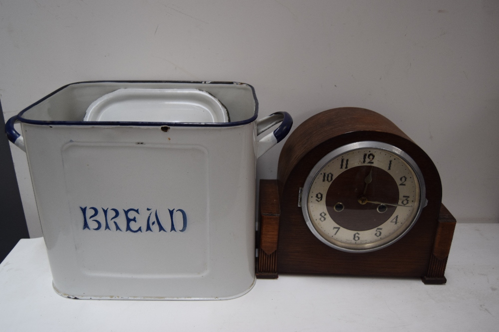 An Edwardian mantel clock together with a vintage enamel bread bin