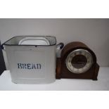 An Edwardian mantel clock together with a vintage enamel bread bin